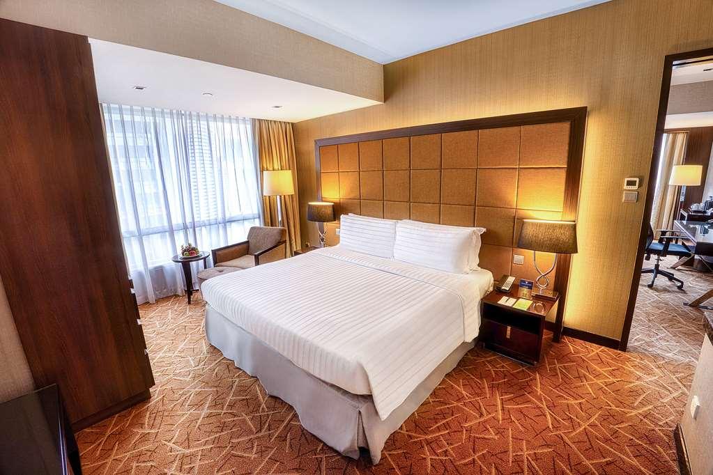Wyndham Singapore Hotel Room photo A bedroom at the hotel