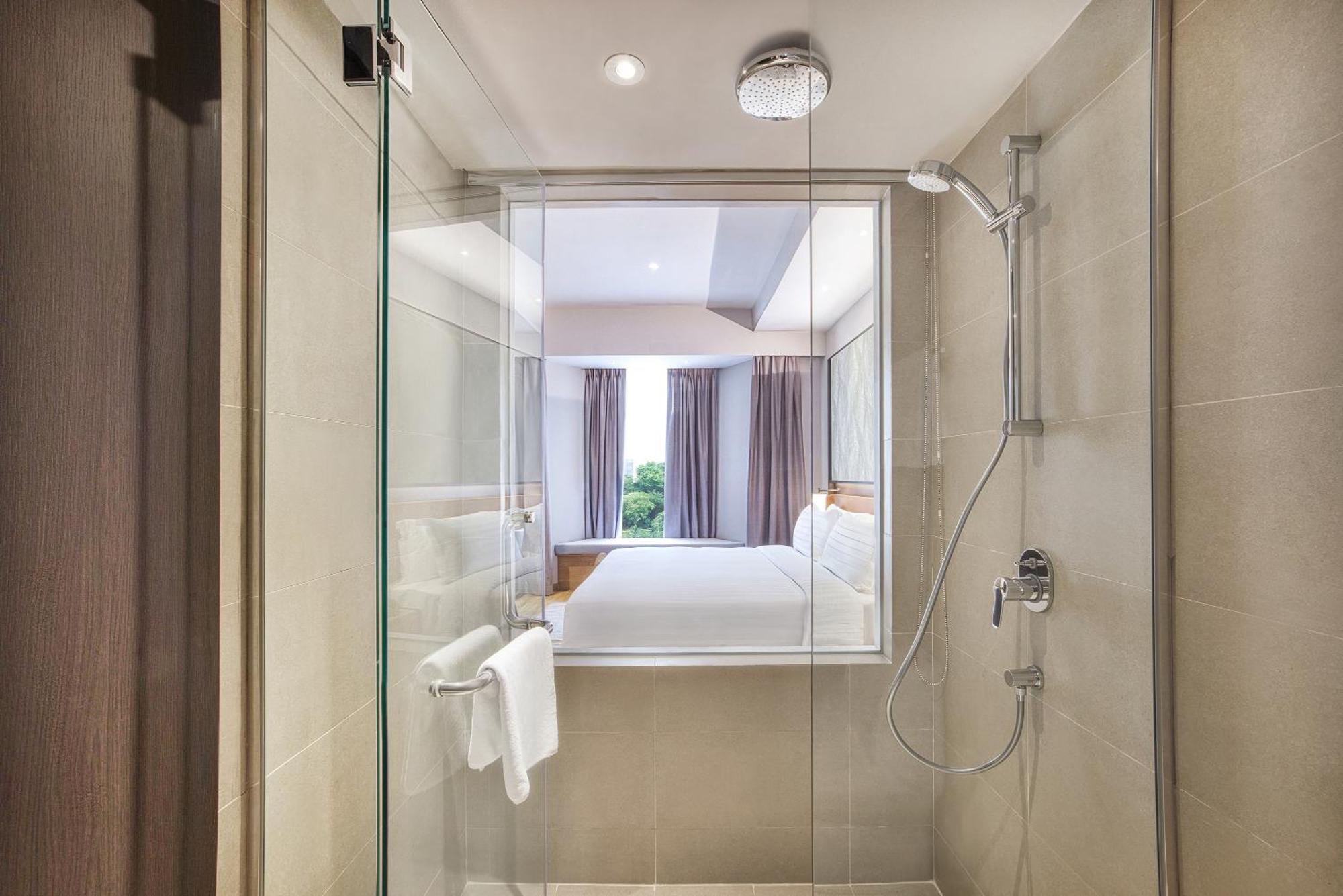 Wyndham Singapore Hotel Exterior photo A shower with a glass door